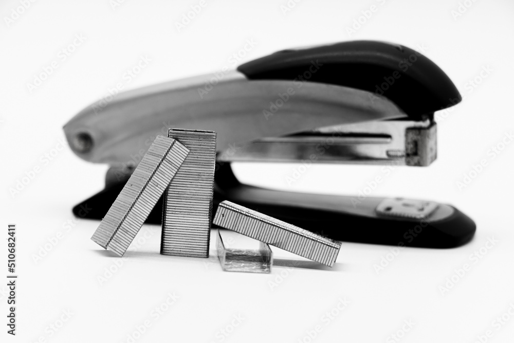 stapler pins with stapler isolated on white background. it is office and stationary tools. stapler pins with stapler isolated on white background. it is office and stationary tools.
