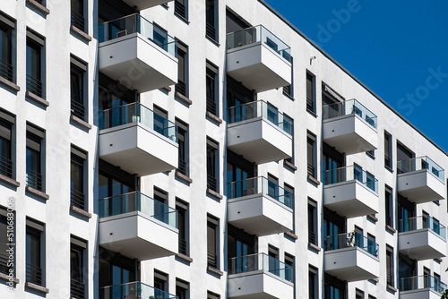 balconies on apartment building facade, residential real estate