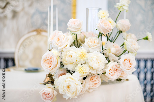 Flower arrangement in the center of the table