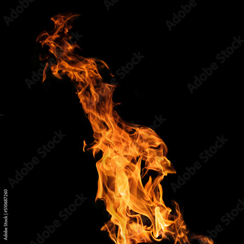 Flames or fire isolated on a black background. Burning gasoline of bright red color