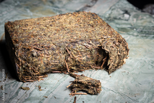 Pu-erh fermented Chinese tea in a roll.