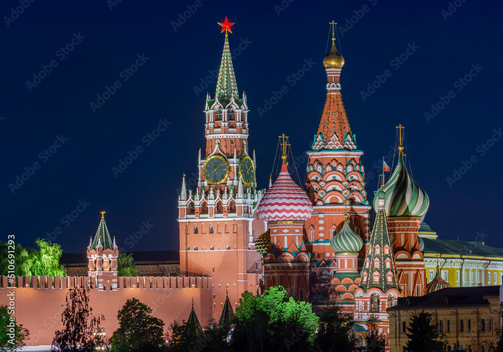 Moscow cityscape with cathedral of Vasily the Blessed (Saint Basil's Cathedral) and Spasskaya Tower of Moscow Kremlin on Red Square at night, Russia