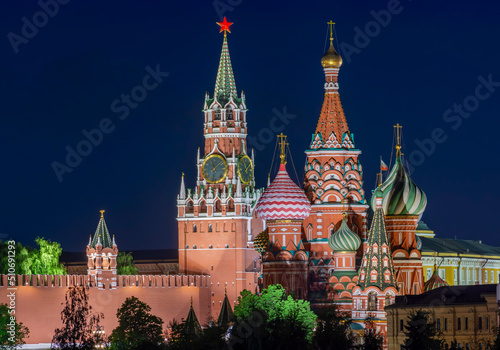 Moscow cityscape with cathedral of Vasily the Blessed (Saint Basil's Cathedral) and Spasskaya Tower of Moscow Kremlin on Red Square at night, Russia