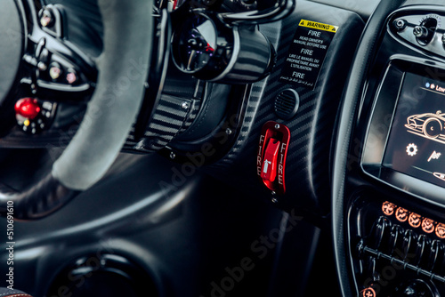 Fire suppression system switch on a car dashboard © Brandon Woyshnis