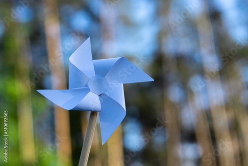 paper windmill on natural background