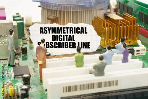 On the motherboard there are figures of people and torn paper with the inscription -Asymmetrical Digital Subscriber Line