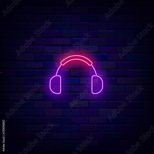 Headphones neon icon. Acoustic equipment. Record studio. Music store. Vector stock illustration