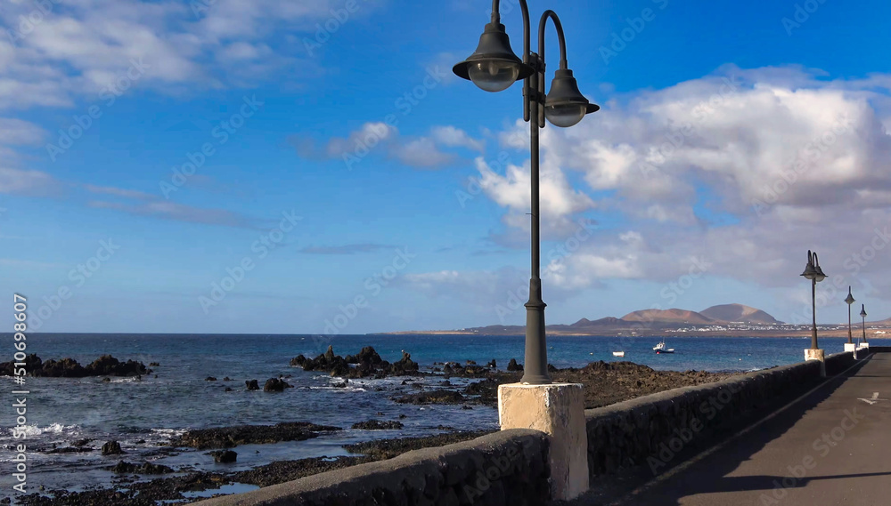 photographic image of a walk where you can see the coast and the volcanoes of Lanzarote. Canary Islands. Spain