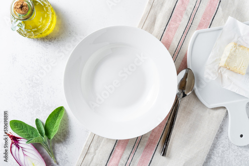 set of empty dishes on the table on a white background