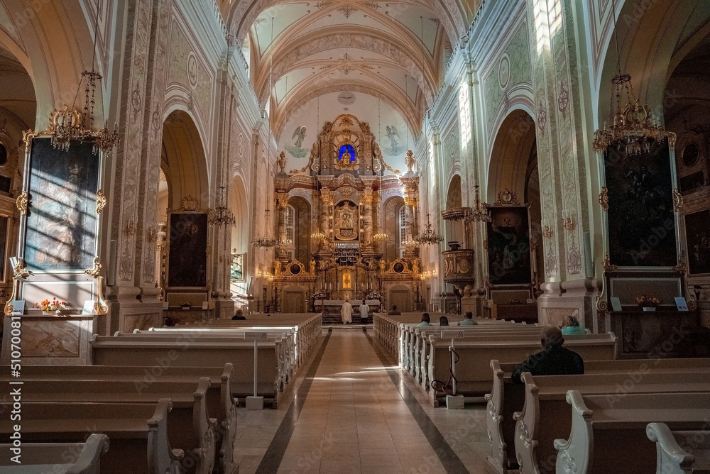 Main nave of Assumption of Virgin Mary Cathedral in Aglone, Latvia. View of the main altar and central hall in the catholic Church