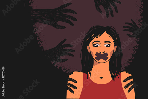 The contours of hands emanating from the darkness around a vulnerable young woman, as a symbol of sexual violence, harassment, abuse, hatred.