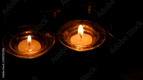 Candles burning in a catholic church