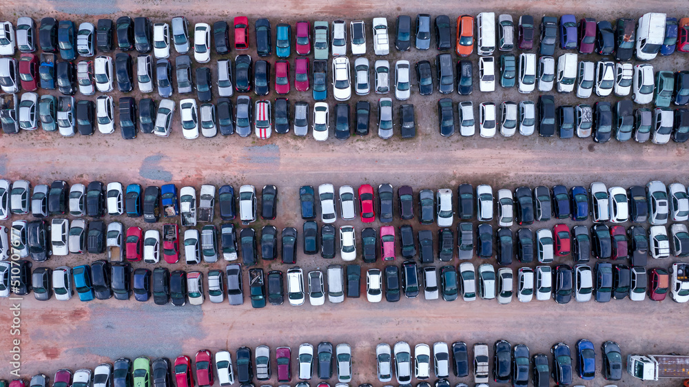 Yard of abandoned cars and seized for irregularity by the police. With many cars and many motorcycles parked. Aerial view Yard of abandoned cars and seized for irregularity by the police. With many cars and many motorcycles parked. Aerial view