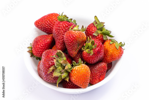 Bowl of strawberries on a white background