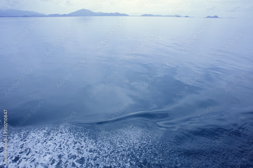 Beautiful sea waves with a lot of foam and bubbles on surface . Beautiful sea waves with a lot of foam and bubbles on surface .