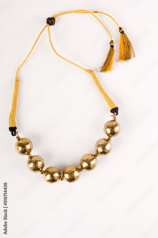golden necklace isolated on white background golden necklace isolated on white background