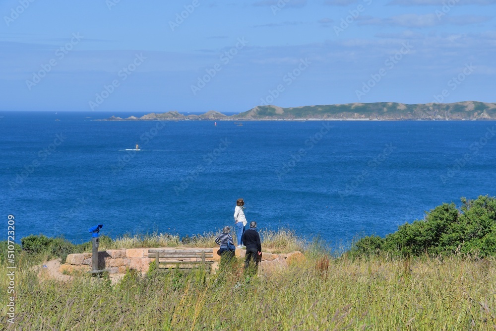 People visiting the pink granite coast in brittany-France