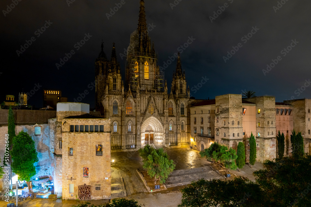 Night view of the Gothic Barcelona Cathedral and Square in the El Born medieval district of the historic center of Barcelona.