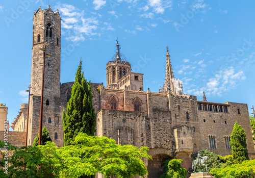 The exterior of the Palau Reigal Major Grand Palace with the sculpted monument to Ramon Berenquer in the courtyard in the historic El Born Gothic center of Barcelona, Spain.