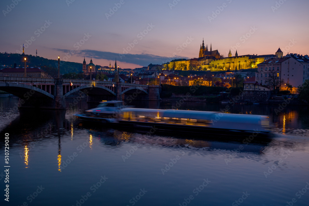 landscape with Vltava river, St. Vitus Cathedral and boat