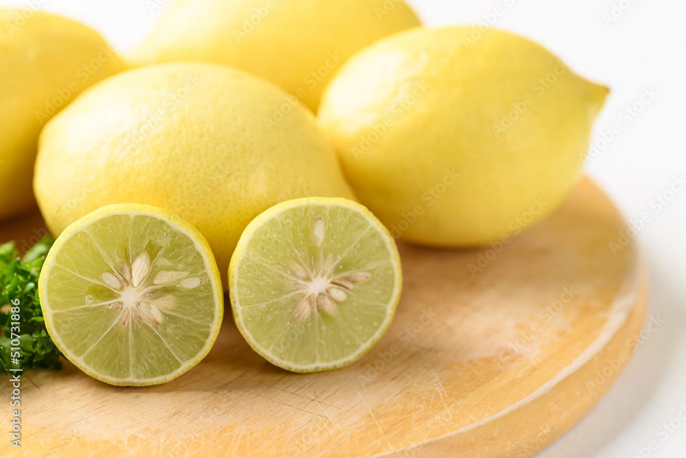 Lemon fruit and lime on wooden board, Citrus fruit Lemon fruit and lime on wooden board, Citrus fruit