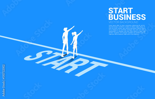 Silhouette of businessman and businesswoman point finger ahead from start line. business concept of ready to start career and teamwork.