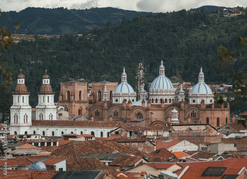 cathedral of the inmaculada concepcion in cuenca- ecuador seen from far away, where its 3 towers stand out.