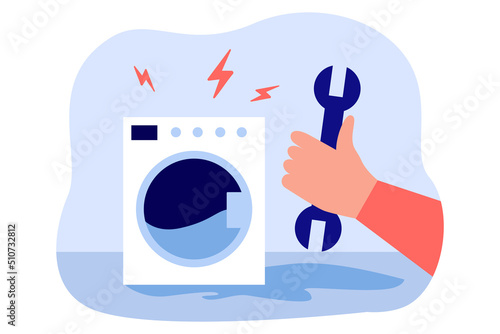 Broken washing machine and hand with wrench. Repairman fixing household appliances flat vector illustration. Occupation, maintenance, service concept for banner, website design or landing web page