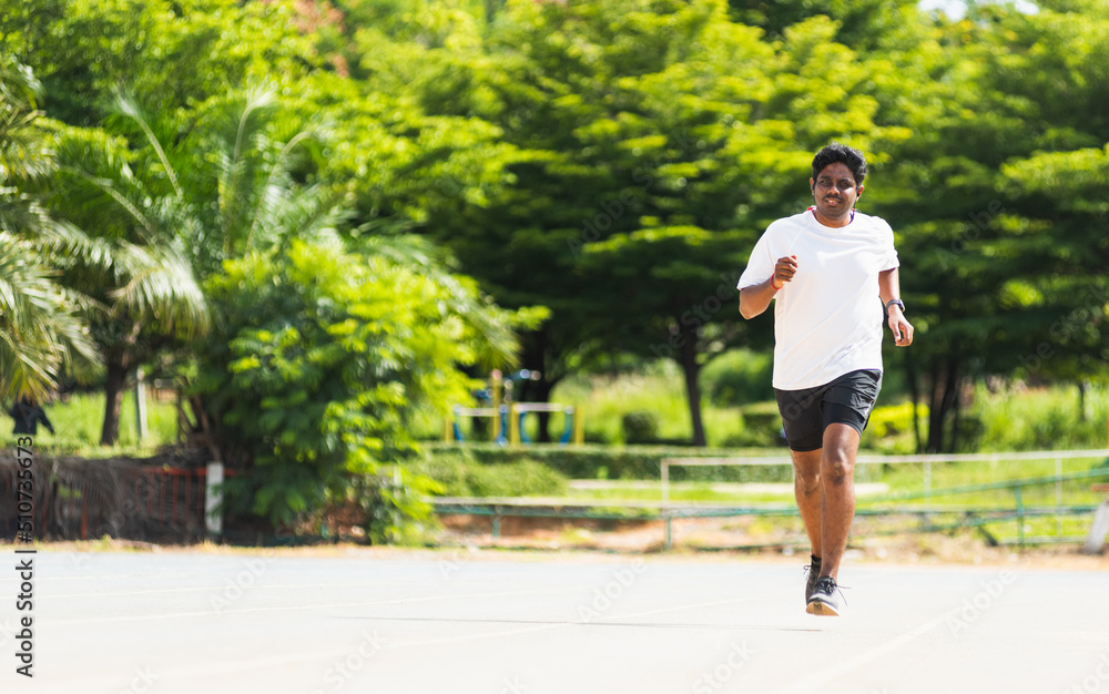 Asian young lifestyle athlete sport runner black man wear feet shoe active running training at the outdoor on the treadmill line road, healthy exercise workout Asian young lifestyle athlete sport runner black man wear feet shoe active running training at the outdoor on the treadmill line road, healthy exercise workout