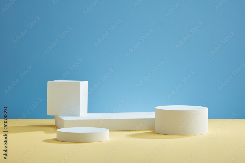 Front view of white podium with blank space in blue background abstract content Front view of white podium with blank space in blue background abstract content