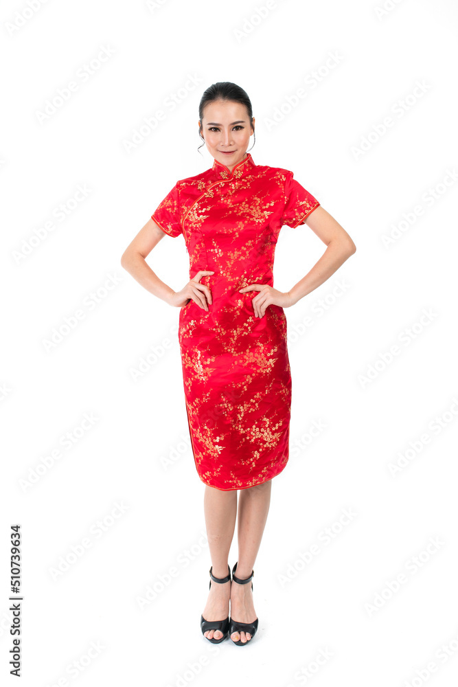 Full body of Asian Chinese Woman wearing red color traditional Chinese costume Cheongsam looking at camera Full body of Asian Chinese Woman wearing red color traditional Chinese costume Cheongsam looking at camera