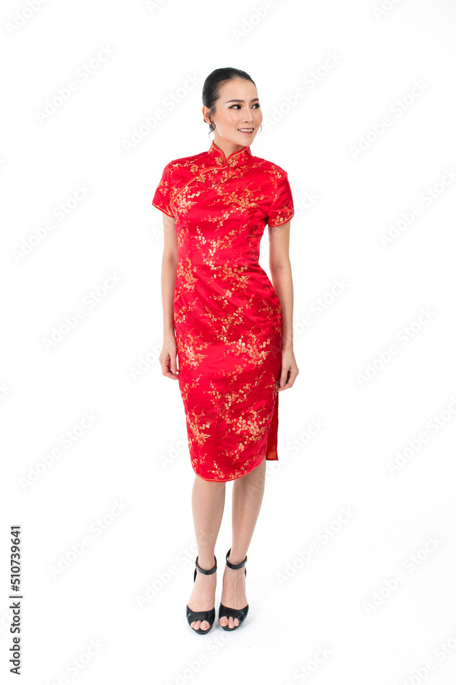 Full body of Asian Chinese Woman wearing red color traditional Chinese costume Cheongsam looking away Full body of Asian Chinese Woman wearing red color traditional Chinese costume Cheongsam looking away