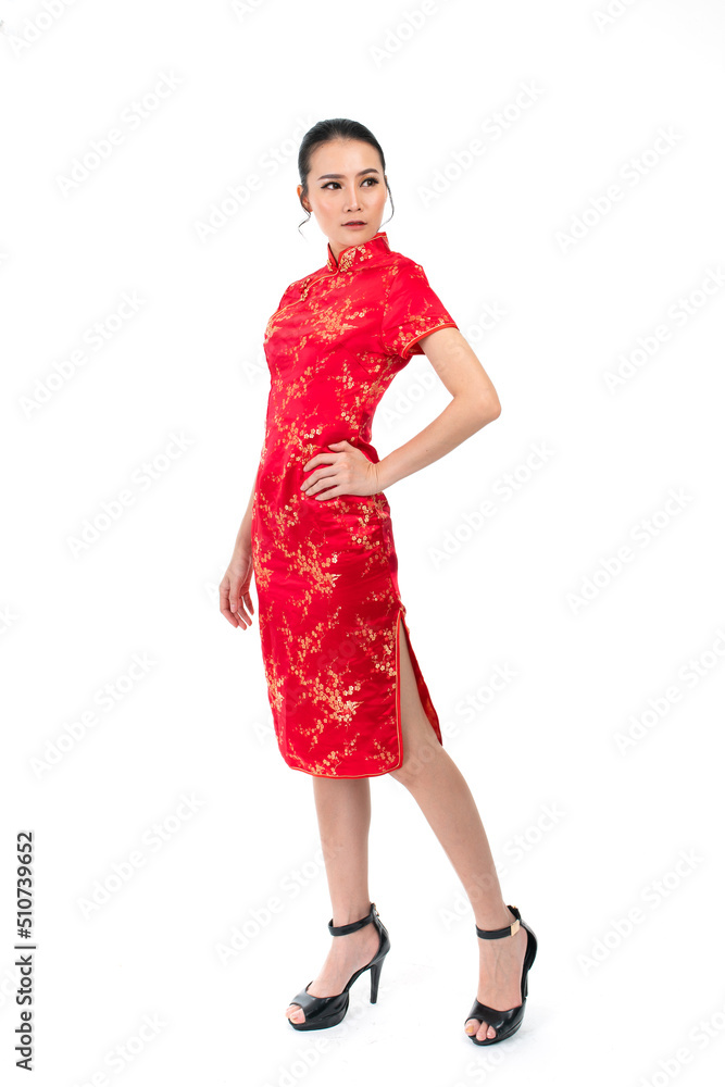 Portrait of a young asian Chinese female lady model wearing red traditional vintage costume Cheongsam smiling and posing with different poses and gestures Portrait of a young asian Chinese female lady model wearing red traditional vintage costume Cheongsam smiling and posing with different poses and gestures