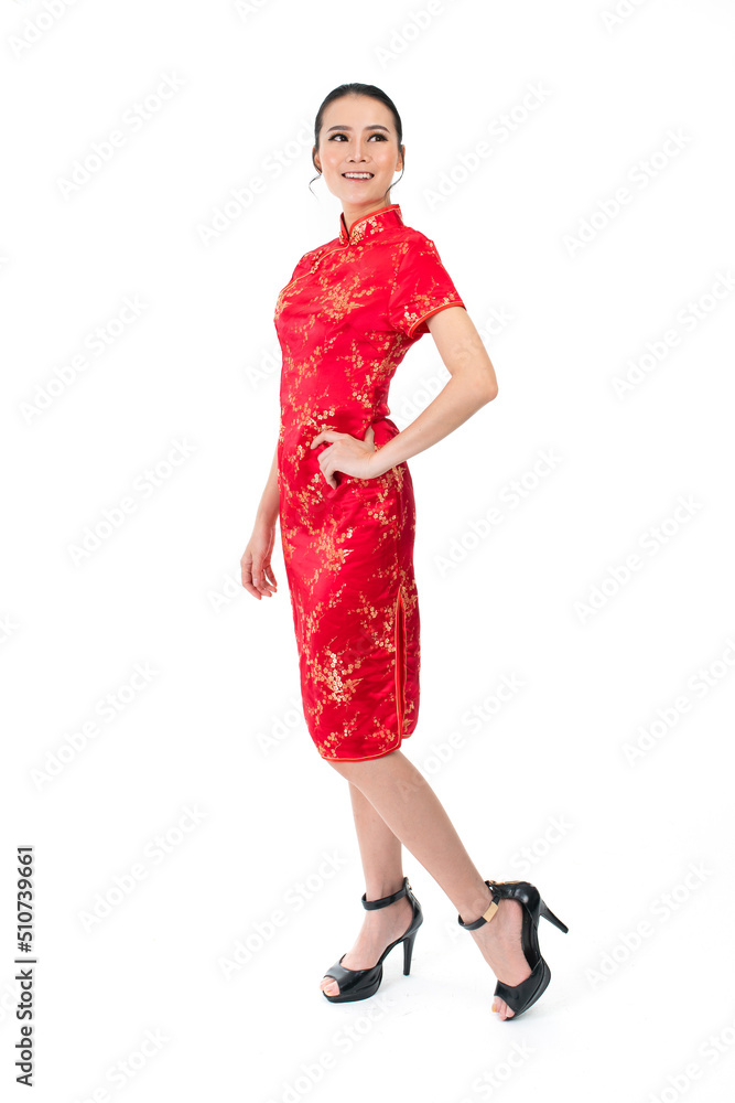 Portrait of a young asian Chinese female lady model wearing red traditional vintage costume Cheongsam smiling and posing with different poses and gestures Portrait of a young asian Chinese female lady model wearing red traditional vintage costume Cheongsam smiling and posing with different poses and gestures
