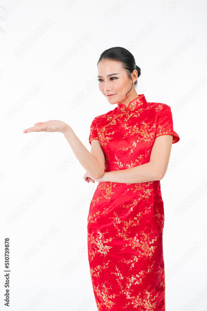 Portrait of a young asian Chinese female lady model wearing red traditional vintage costume Cheongsam smiling and posing with different poses and gestures Portrait of a young asian Chinese female lady model wearing red traditional vintage costume Cheongsam smiling and posing with different poses and gestures