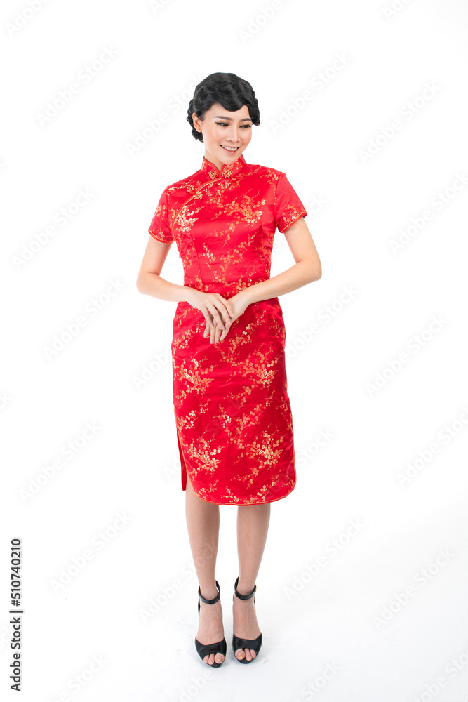 Portrait of a young asian Chinese female lady model wearing red traditional vintage costume Cheongsam smiling and posing with different poses and gestures Portrait of a young asian Chinese female lady model wearing red traditional vintage costume Cheongsam smiling and posing with different poses and gestures