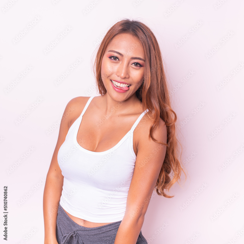 Beautiful and friendly young asian sexy female lady model wearing white tops posing happily with different poses, gestures and emotions