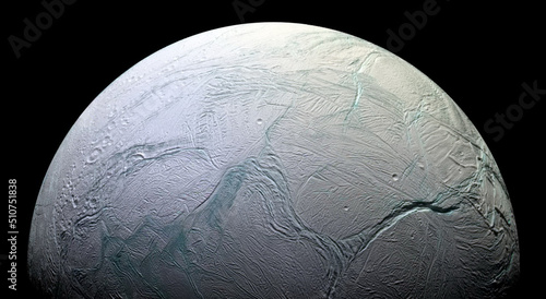 Enceladus the sixth largest moon of planet Saturn. photo