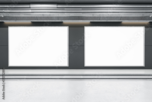 Front view on two blank white banners in concrete frame with empty space in undeground area with light grey floor and rails. 3D rendering, mock up