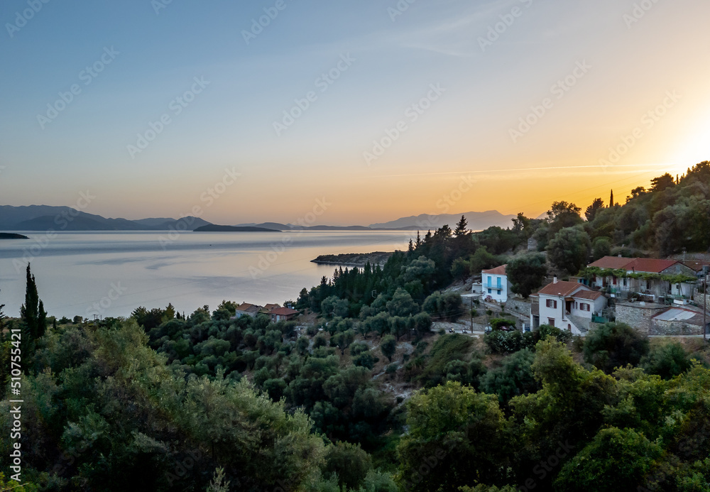 A beautiful sunrise over a village in Ithaca, Greece.