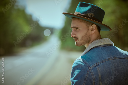 hitchhiker standing by road