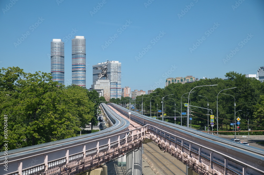 Fototapeta premium Moscow, Russia - June 8, 2022: View of the monorail and the monument 