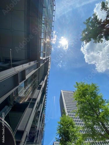 Sunny city sky in Tokyo Otemachi district  office buildings and the urban environment  year 2022 June 13th  sunny weekday