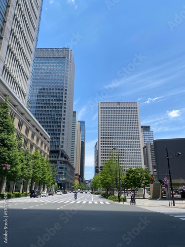 Street pedestrian’s crossings at the Tokyo Station square, city high buildings and the environment, year 2022 June 13th, sunny weekday Japan