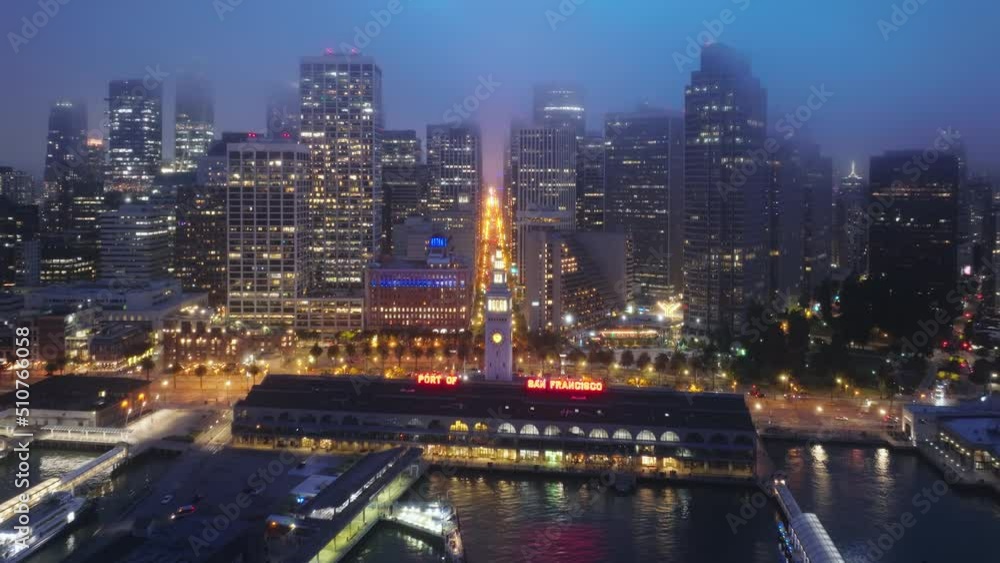 Downtown San Francisco, dark summer night city lights. Illuminated night city, USA 4K b-roll drone shot of night scene. Aerial panorama of Embarcadero and Financial District skyscrapers and buildings Downtown San Francisco, dark summer night city lights. Illuminated night city, USA 4K b-roll drone shot of night scene. Aerial panorama of Embarcadero and Financial District skyscrapers and buildings