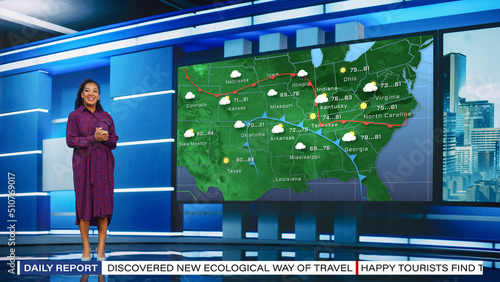 TV Weather Forecast Program: Professional Television Host Reviewing Weather Report in Newsroom Studio, Uses Big Screen with Visuals. Famous Anchorwoman Talks. Mock-up Cable Channel Concept.