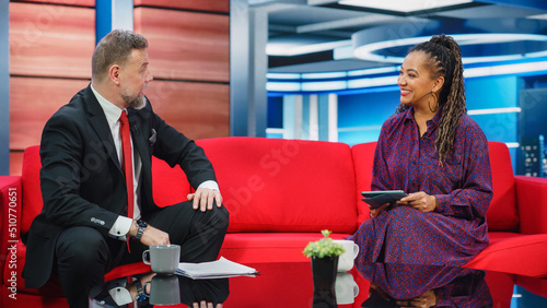 фотографія Talk Show TV Program and News Discussion: Two Cheerful Presenters Talk, Have Fun