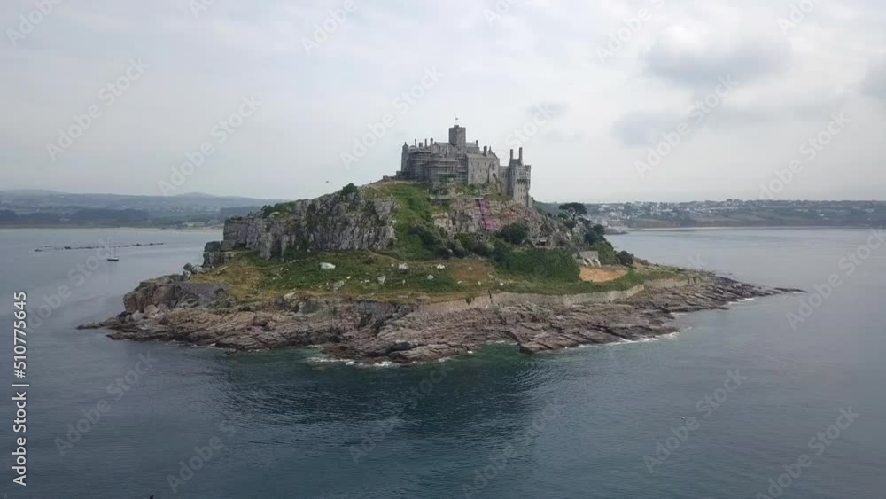 Aerial orbits historic Cornwall UK island castle, St Michael's Mount Aerial orbits historic Cornwall UK island castle, St Michael's Mount