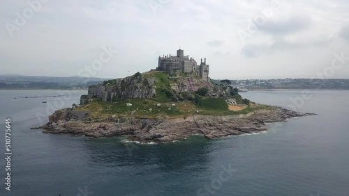 Aerial orbits historic Cornwall UK island castle, St Michael's Mount photo