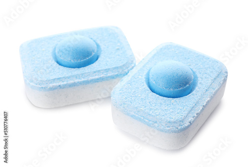 Two water softener tablets isolated on white